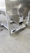 Aluminum gravity feeder filler on an A-frame stand.